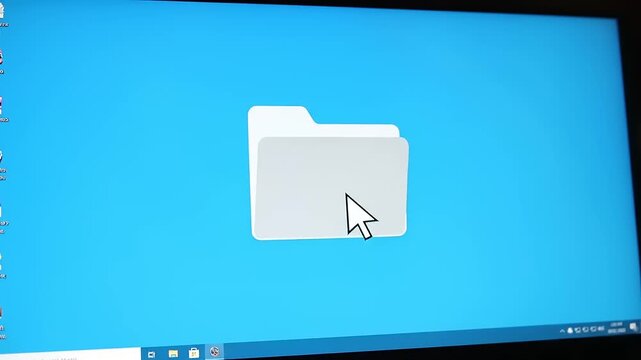 Computer screen displays a white folder icon with a cursor pointing to it.