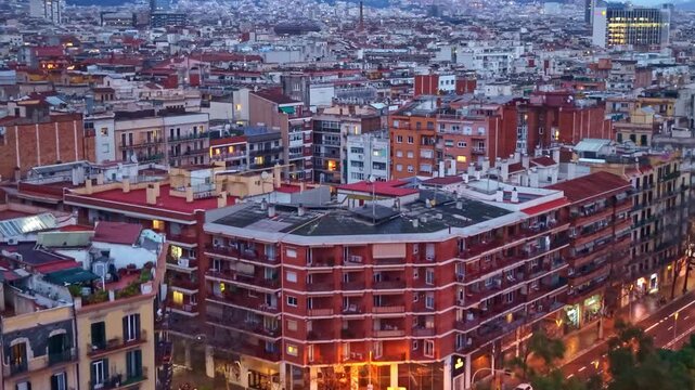 Closer drone fly of The New Left of the Eixample aka La Nova Esquerra de l'Eixample residential district areas, Barcelona, Spain.