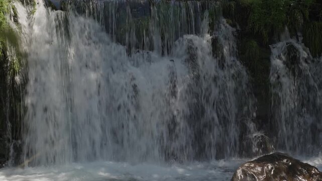 Waterfall flowing over rocky ledge Castanheira de Pera Portugal