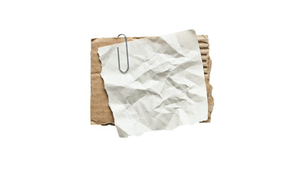 Heavily crumpled white paper pinned to a square of corrugated carton with a silver paperclip on a transparent background