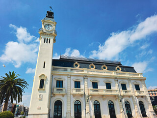 Obraz premium view of Edifici del Rellotge ( Clock Building) a historic landmark built in 1916, located in the port of Valencia