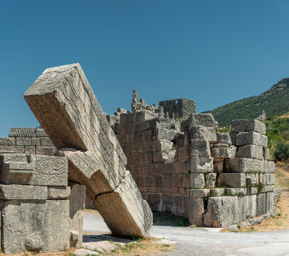 Ancient stone ruins of the Arcadia Gate at Messene archaeological site in Greece 