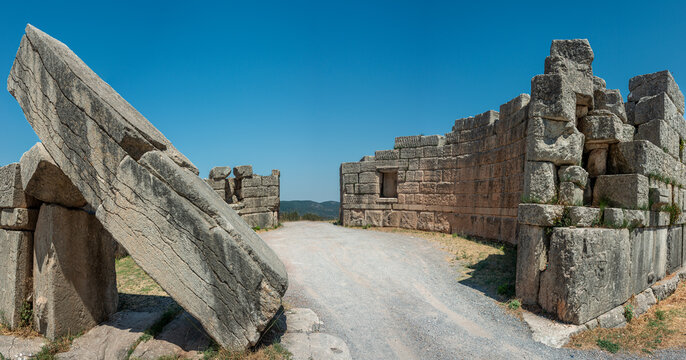 Ancient stone ruins of the Arcadia Gate at Messene archaeological site in Greece 