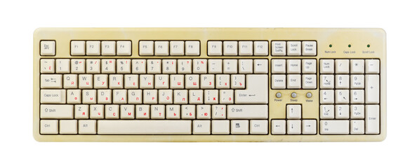 Vintage computer keyboard from the 1990s isolated on white background.