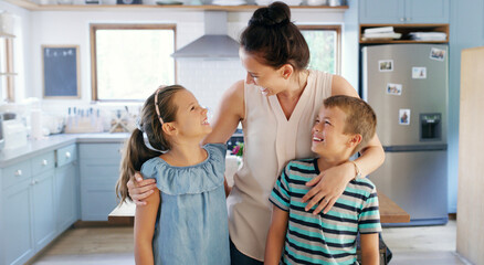 Happy, laugh and mom with children in kitchen embrace for bonding, relationship and love in home....