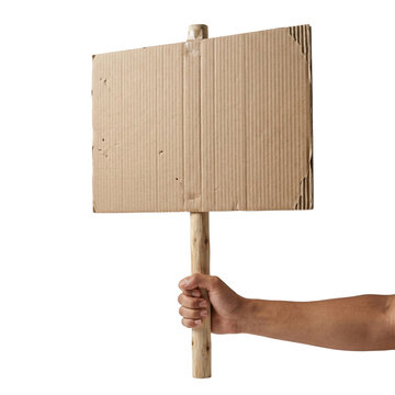 Hand holding a blank cardboard protest sign