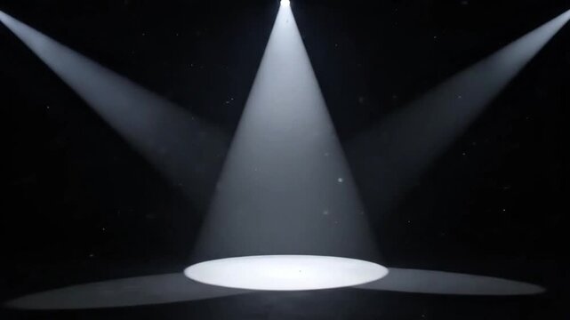 Dramatic stage lighting featuring three powerful spotlights converging to illuminate a central point in an atmospheric, dark setting, creating a striking visual effect for performances or events