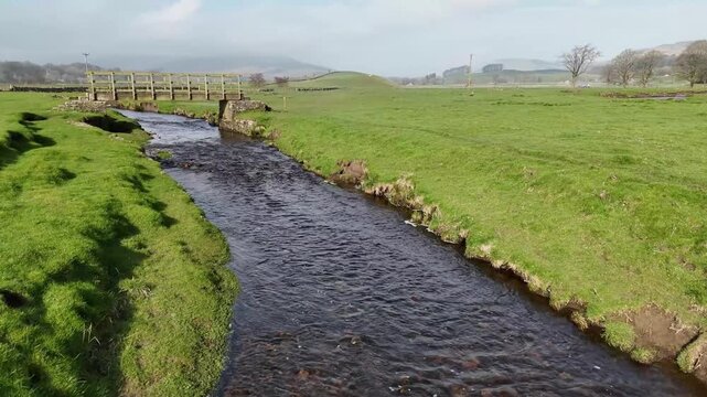 
Aerial view over the River Ure in Hawes from a drone 4K video
