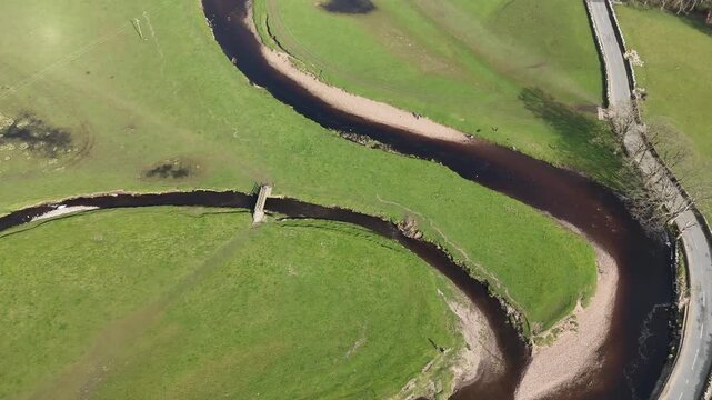 
Aerial view over the River Ure in Hawes from a drone 4K video
