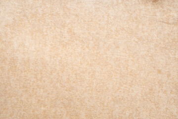 Fototapeta premium Old vintage paper texture background with aged stains and antique yellowed parchment effect