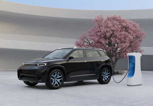 Black Electric SUV charging at charging station. Monolithic design background. 3D illustration.