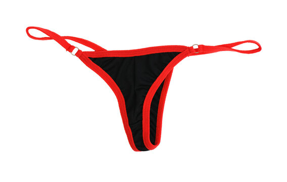 Sexy black thong panties with red trim isolated on a white background.