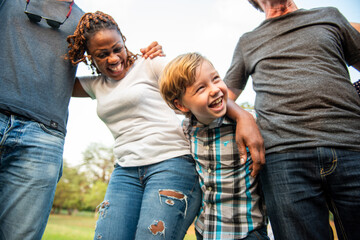 Joyful family outdoor bonding