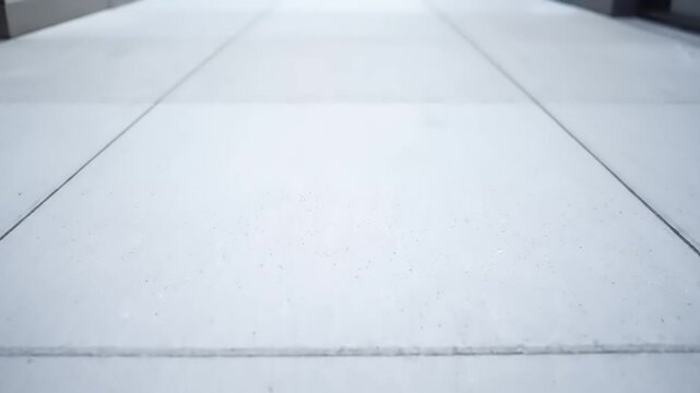 Perspective View of a Clean Concrete Sidewalk with Straight Lines.