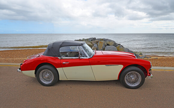 Felixstowe, Suffolk, England - May 04, 2025: Classic Austin-Healey 3000 sports car parked on seafront promenade