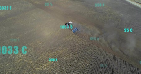 Plowing cab tractor pulling blue harrow across furrows, raising dust plume showing teal data road