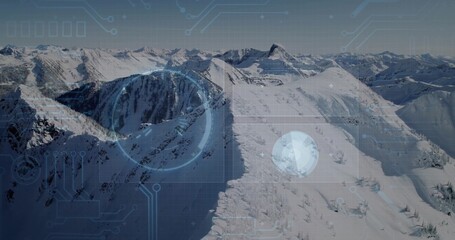 Fototapeta premium Drone surveying snow-covered ridge running right above alpine peaks at high altitude, HUD overlays