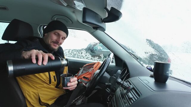 Person Outdoors Enjoys Hot Liquid Drink. Individual Taking Pause With Steaming Beverage Outside During Travel. Someone Outside Relishing Hot Drink While On Move Or Resting Momentarily