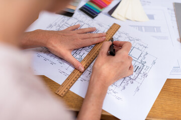 Architect drafting blueprint design.