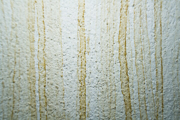 Grungy White Wall with Vertical Brown Water Stains and Rough Texture © Phary