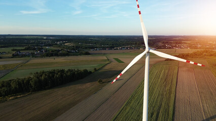 Wind turbine in rural landscape © AlexGo