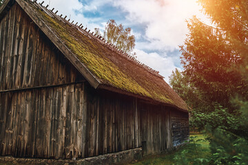Naklejka premium Traditional wooden shed under blue sky
