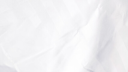 Obraz premium White fabric texture with subtle creases and folds for design backgrounds
