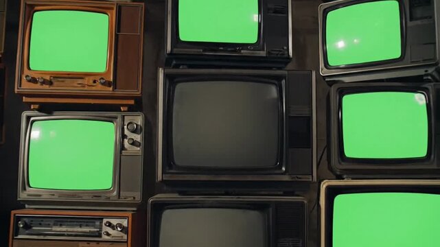 Vintage Television Screens Stacked With Green Screen Display.