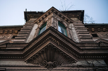 Naklejka premium Grand architectural details of Hungarian Secession style against the sky, old European heritage.