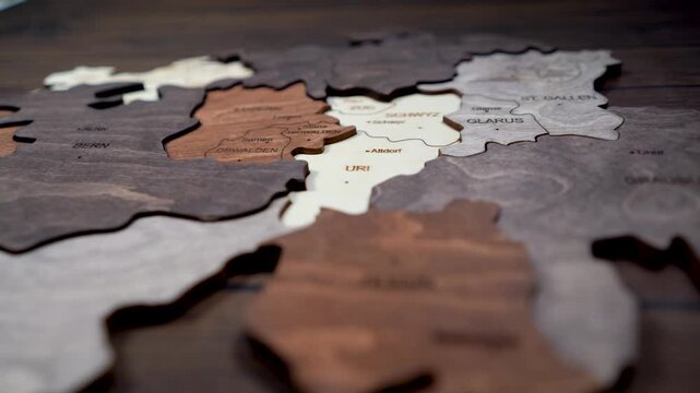 Wooden map of Switzerland world map made of wood as wall decoration. wall decorated with world map Switzerland wood puzzle.