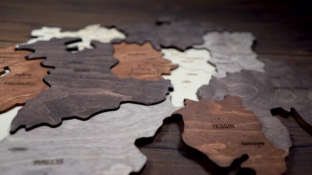 Wooden map of Switzerland world map made of wood as wall decoration. wall decorated with world map Switzerland wood puzzle.