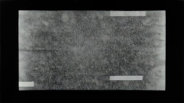 Old retro static black sand white noise signal grain background television screen texture icon minimalist abstract rectangle with subtle pattern and muted contrast evoking vintage broadcast