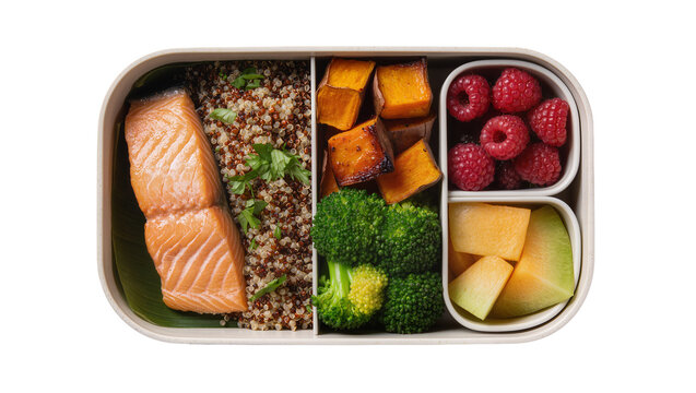 Isolated bento box with healthy food salmon quinoa sweet potato broccoli raspberries melon