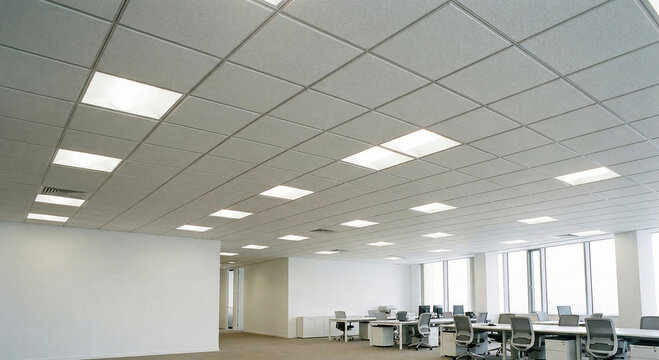 Suspended ceiling lighting panels in modern office