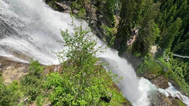 Stuibenfall waterfall bigest waterfall in Tirol in the Otztal valley in Tyrol Austria during a beautiful springtime day in the Alps. Vertical video.
