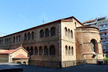 Fototapeta premium Byzantine Acheiropoietos Basilica brick facade August 2024 church exterior with arched windows and rooftops