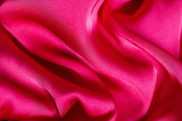 Fototapeta premium Pink silk fabric texture background. Macro. Abstract. Seamless background. Fabric seamless patterns.