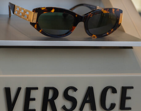 Versace sunglasses with classic Greek key pattern in gold metal on the arms.Milan - italy,07 March 2026