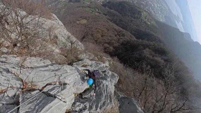 Via Ferrata Corno Rat, Valmadrera, Lecco, Lombardia - 22 climbers ascend the via ferrata on vertical walls with sweeping views of the city