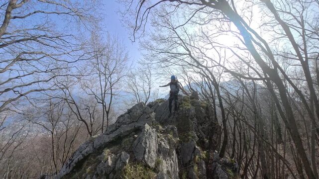 Via Ferrata Corno Orientale, Valmadrera, Lecco, Lombardia - An hiker walks on the top of the mountain