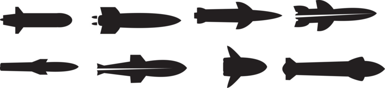 A collection of black silhouettes of ballistic missiles isolated on a white background.
