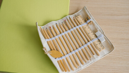 Eco-friendly pencil set with ruler on wooden desk