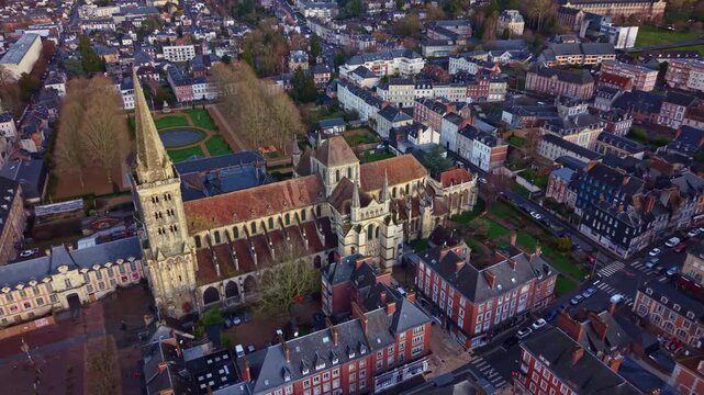 Saint-Pierre Cathedral and the formal Bishop's Garden, Lisieux in Normandy, France. Aerial drone sideways