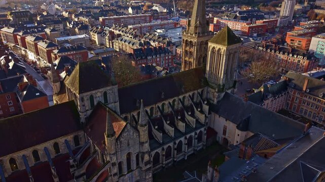 Saint-Pierre Cathedral, Lisieux in Normandy, France. Aerial drone ascending and cityscape