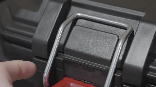 High angle shot of a hinge opening on a toll box.