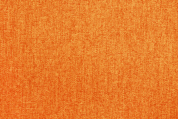 Fototapeta premium Orange fabric cloth texture for background, natural textile pattern.