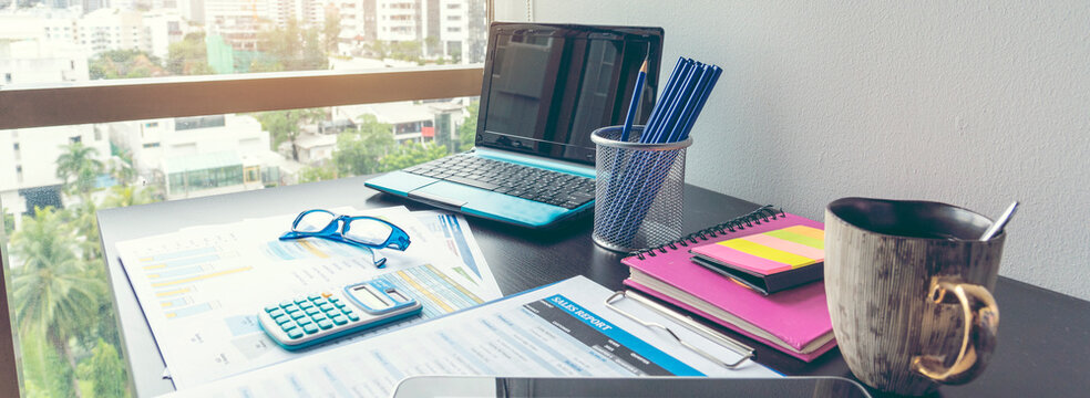Banner Business Graphs charts office desk with copy space. Surfing internet online technology lifestyle. Banner Financial Planning Account Database Report. Technology lifestyle. Finance Excel graph
