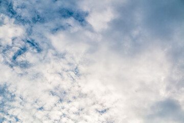 Background of blue sky with blue cloud with tiny,large clouds
