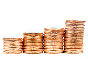 Close up of coins to stack of coins.
