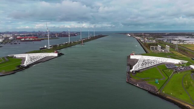 The Maeslantkering, or Maeslant barrier, is a storm barrier in the Rhine Delta in the Netherlands for flood protection. It is one of the largest moving structures on Earth. High quality 4k footage